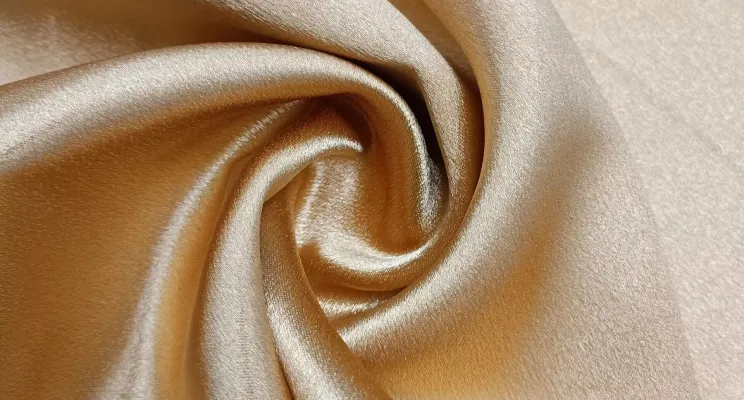 Ivory silk CDC fabric swatch in warm off-white