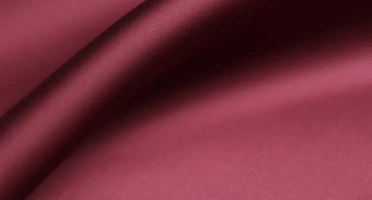 Red stretch silk fabric swatch showing saturated color