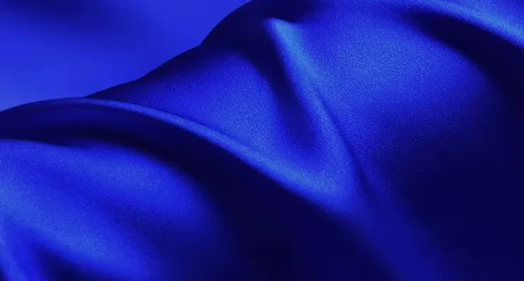 Dark blue silk CDC fabric close-up showing crepe texture
