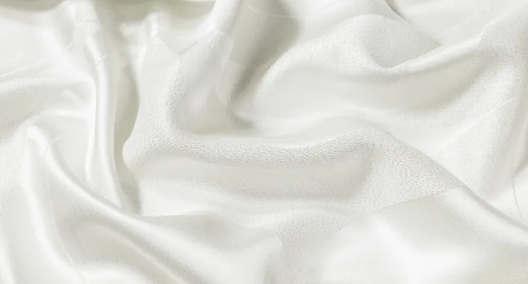 White silk viscose fabric showing soft blended surface