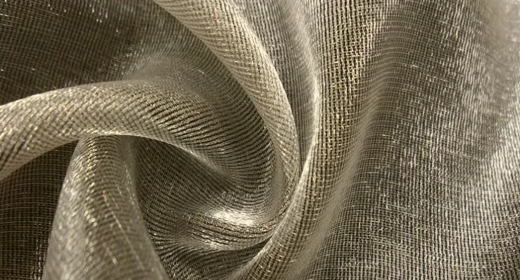 Gold metallic silk organza fabric with shimmer threads