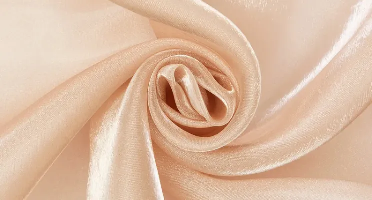 Ivory silk organza fabric with crisp structured drape