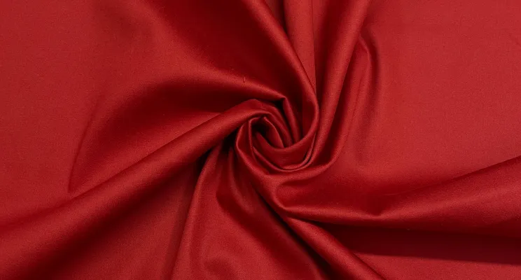 Red silk cotton fabric showing saturated blend color