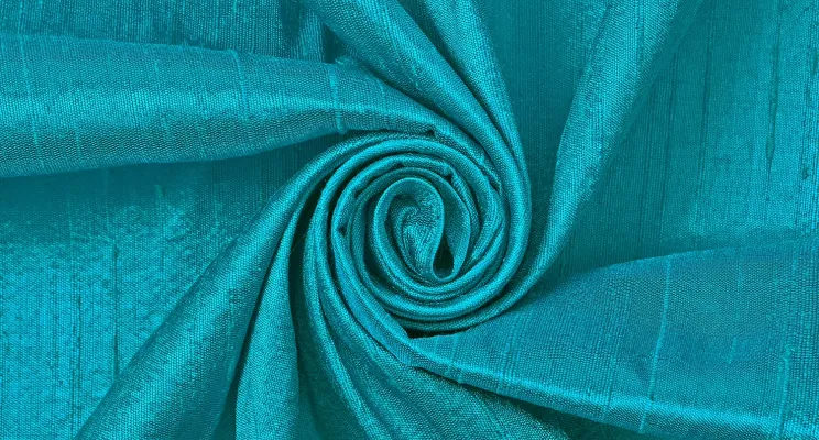 Blue silk dupioni fabric detail in rich jewel tone