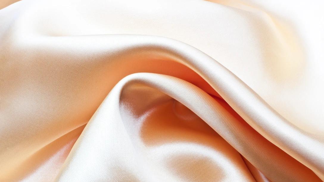Sandwashed Silk: A Manufacturer's Guide to the Process, Best Fabric Bases & Garment Applications